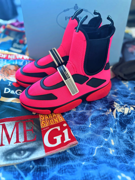 Prada Woman’s Fall/Winter 2018 Luxury Fluorescent Neon Pink/Black Mesh and Rubber Prada Cloudbust High-Top Sneakers